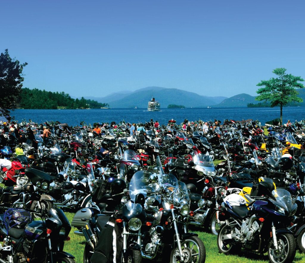 large-group-of-motorcycles-in-front-of-lake-george-ny