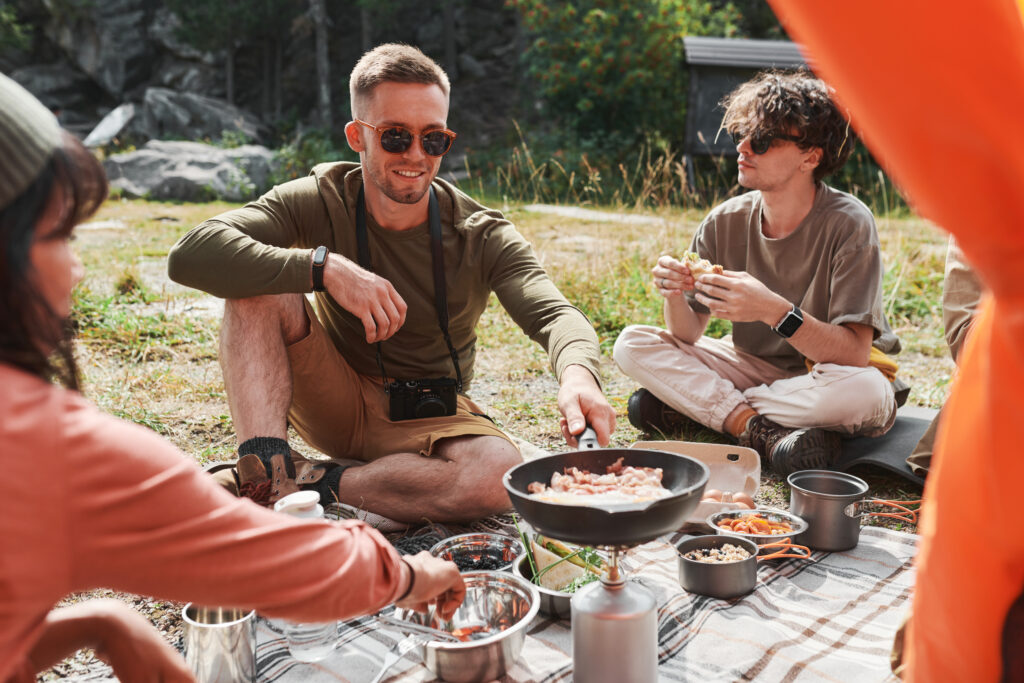 Friends-cooking-breakfast-camping