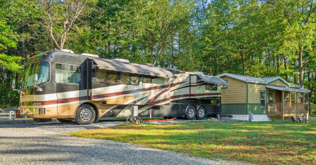 RV-camper-next-to-cabin 