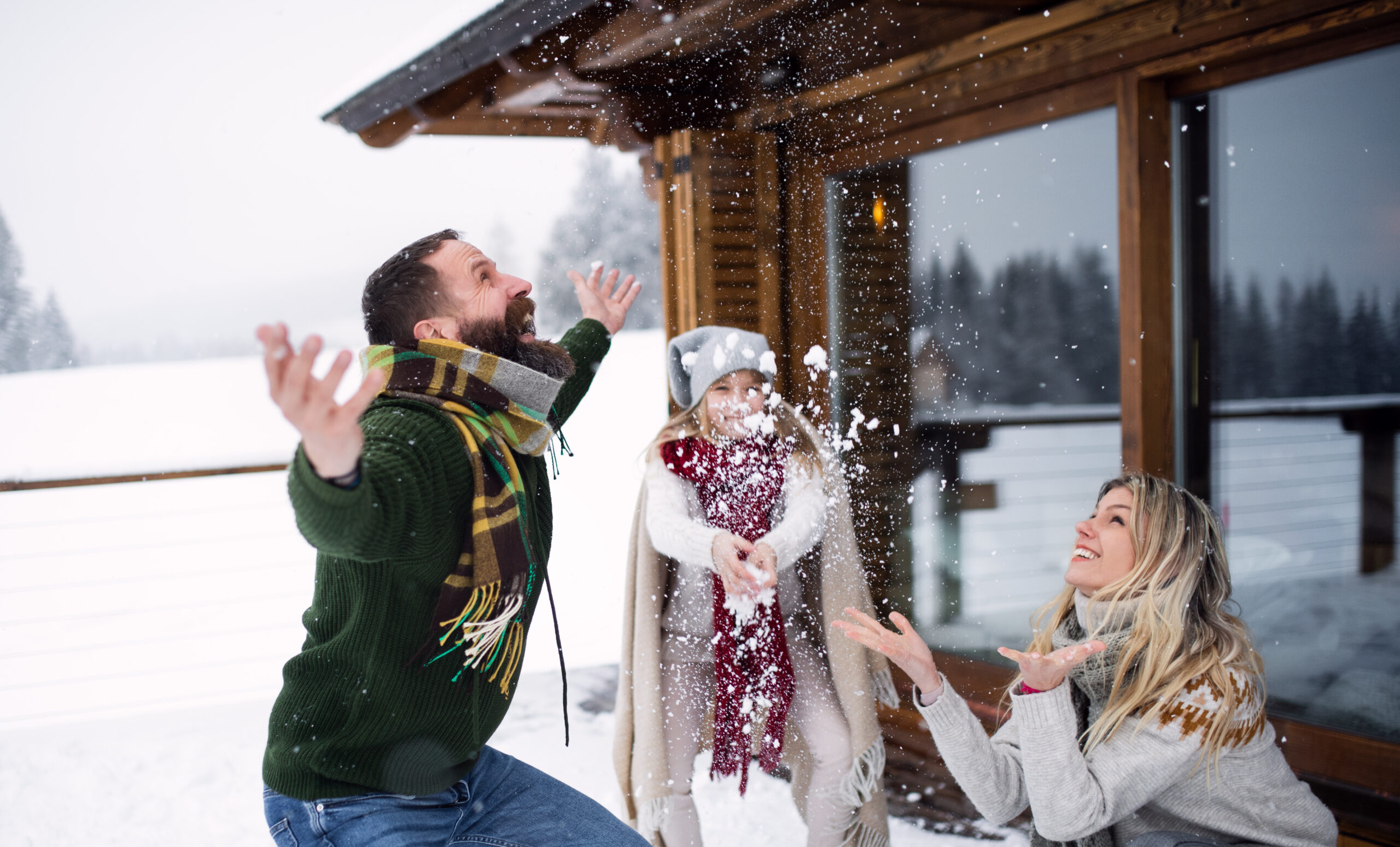 family-throwing-snow