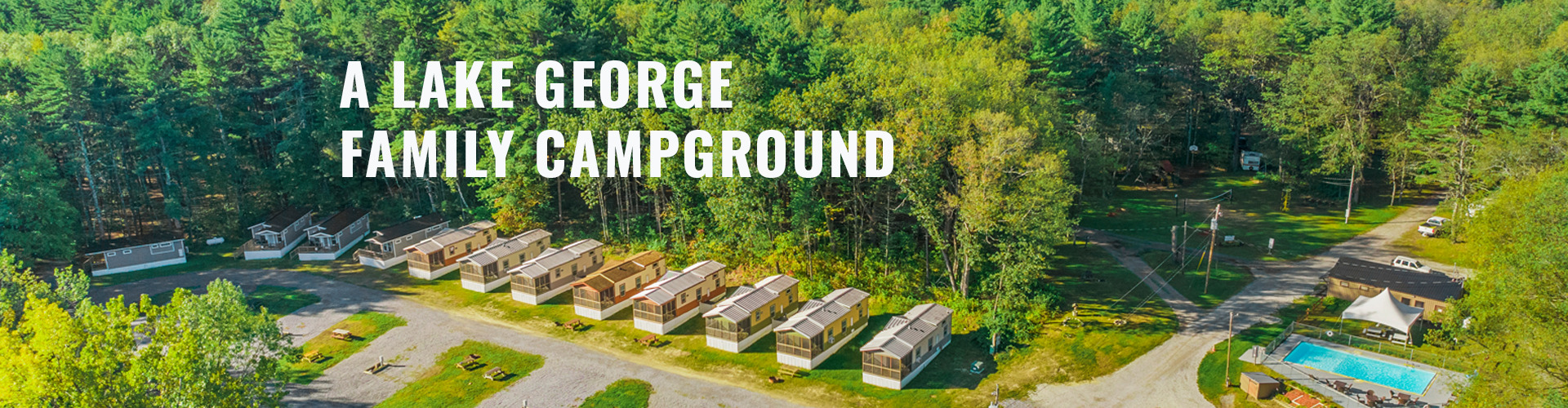 aerial photo of campground with text overlay "A Lake George Family Campground"