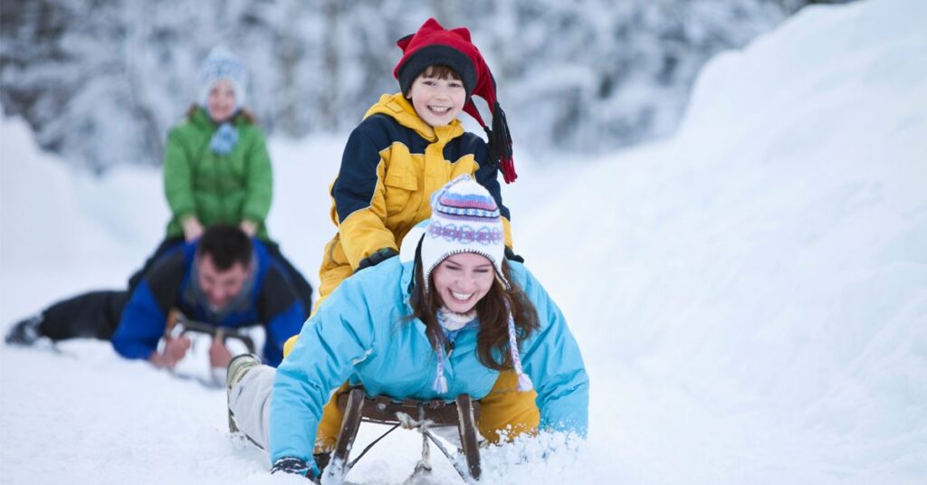 kids and parents sled