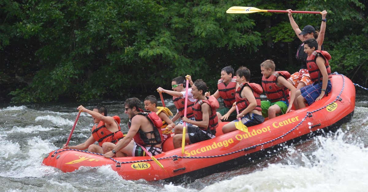 group of teens rafting on Hudson River
