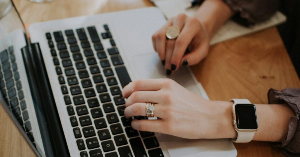 woman working on a computer at a desk